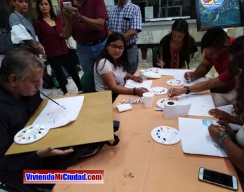 Joel Ramos en el Dia Munidal Pintor Boca y Pie